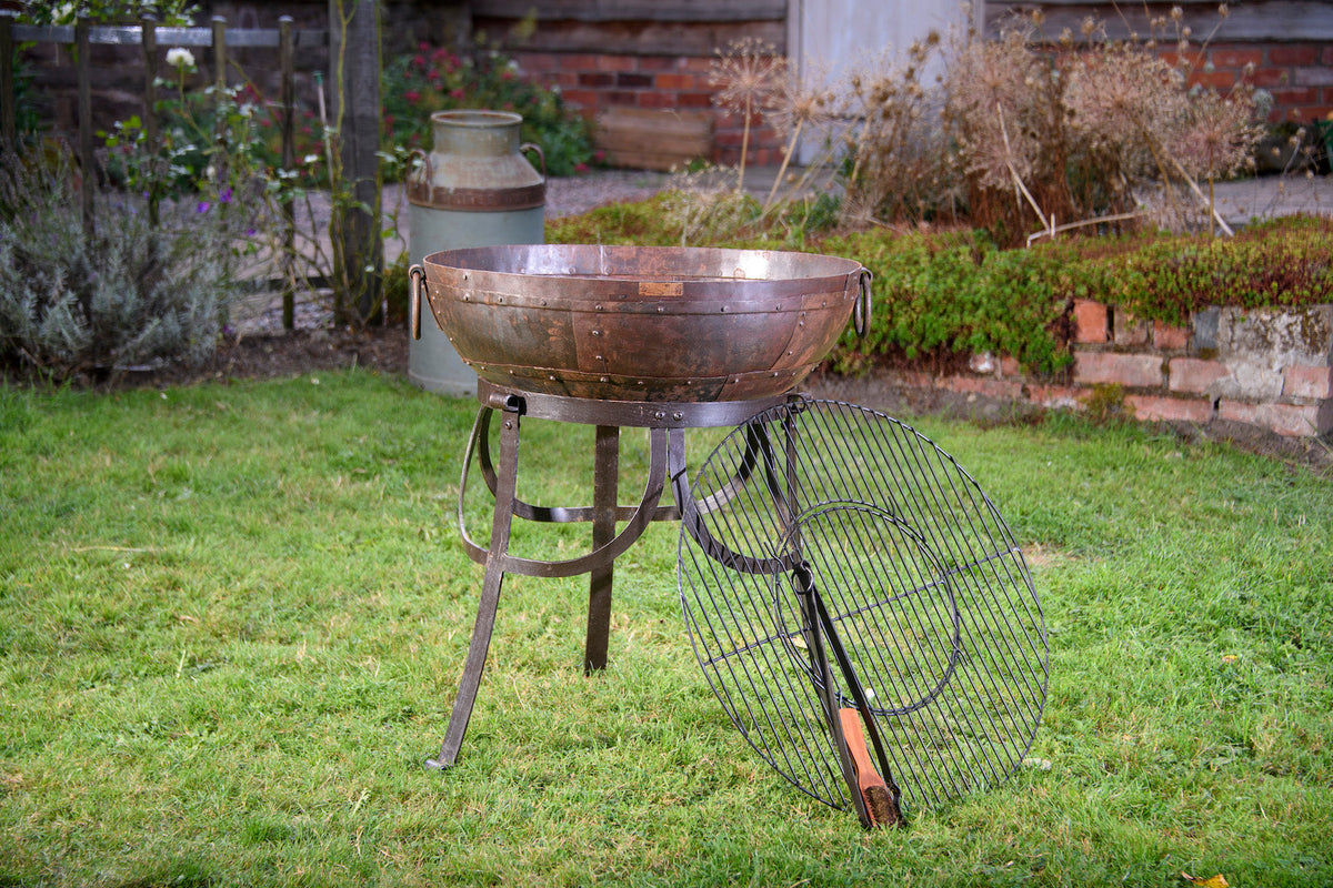 http://www.thefirebowlshop.com/cdn/shop/collections/Recycled_Kadai_on_High_Stand_1_1200x1200.jpg?v=1700612876